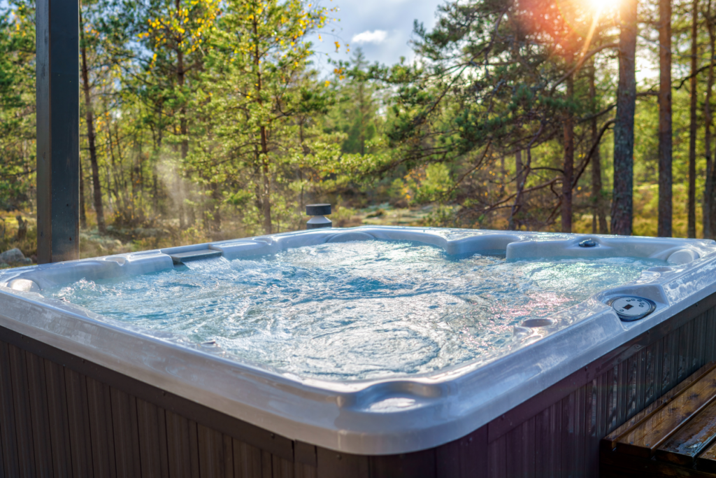 Luxury outdoor hot tub by California Custom Pool, surrounded by nature.